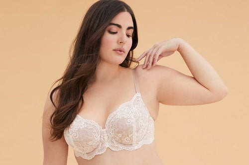 Model with white balconette bra