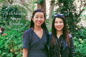 Float There founders, Angela Jiang and Linda Ye, posing in front of greenery.