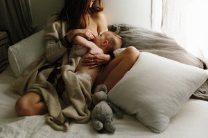 Mother breastfeeding baby
